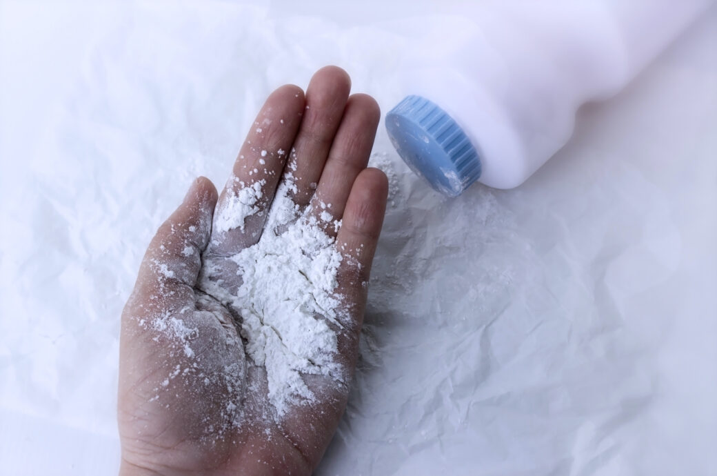 Healthy concept; Baby talcum powder on white background, dust dangerous for breath system
